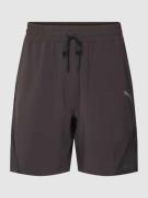 PUMA PERFORMANCE Shorts mit Label-Print Modell 'Woven' in Black, Größe...