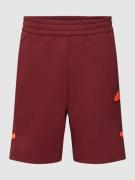 ADIDAS SPORTSWEAR Sweatshorts mit seitlichen Eingrifftaschen in Bordea...