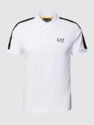 EA7 Emporio Armani Regular Fit Poloshirt mit Label-Print in Weiss, Grö...