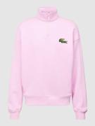 Lacoste Loose Fit Sweatshirt mit Stehkragen und Reißverschluss in Rosa...