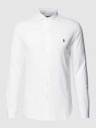 Polo Ralph Lauren Hemd mit Kentkragen, unifarbenes Design und Knopflei...