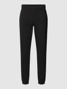 CK Calvin Klein Comfort Fit Sweatpants im unifarbenen Design in Black,...