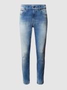 Tommy Jeans Slim Fit Jeans mit Stretch-Anteil Modell 'Austin' in Hellb...