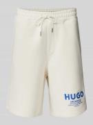 Hugo Blue Shorts mit Allover-Muster in Offwhite, Größe M