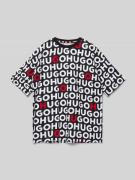 HUGO T-Shirt mit Allover-Label-Print in Rot, Größe 152