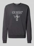 Guess Sweatshirt mit Label-Print Modell 'TREATED' in Black, Größe L