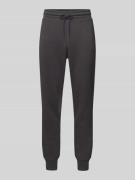 PUMA PERFORMANCE Tapered Fit Sweatpants mit Label-Print in Black, Größ...