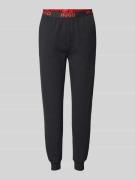 HUGO Relaxed Fit Sweatpants mit elastischem Label-Bund Modell 'SPORTY'...