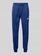 ADIDAS SPORTSWEAR Sweatpants mit elastischem Bund in Marine, Größe L