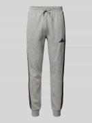 ADIDAS SPORTSWEAR Relaxed Fit Sweatpants mit Logo-Stitching in Hellgra...