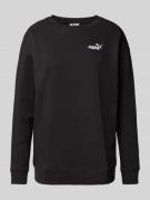 PUMA PERFORMANCE Sweatshirt mit Label-Stitching in Black, Größe M