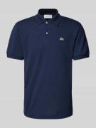 Lacoste Classic Fit Poloshirt mit Label-Badge in Dunkelblau, Größe L