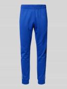 adidas Originals Regular Fit Trainingshose mit elastischem Bund in Roy...