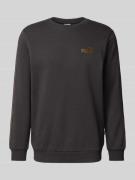 PUMA PERFORMANCE Sweatshirt mit Label-Print in Black, Größe L