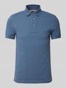 Tommy Hilfiger Slim Fit Poloshirt mit Logo-Stitching Modell '1985' in ...