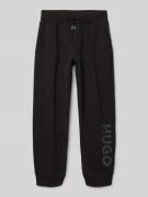 HUGO Relaxed Fit Sweatpants mit Label-Print in Black, Größe 152