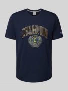 CHAMPION T-Shirt mit Label-Print in Marine, Größe L