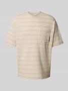 Calvin Klein Jeans T-Shirt mit Brusttasche in Beige, Größe L