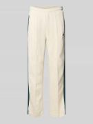 PUMA PERFORMANCE Flared Fit Sweatpants mit elastischem Bund in Offwhit...