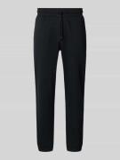 MCNEAL Regular Fit Sweatpants mit elastischen Beinabschlüssen in Black...