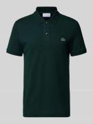 Lacoste Slim Fit Poloshirt aus reiner Baumwolle in Bottle, Größe XS