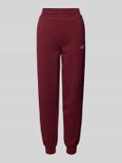 PUMA Slim Fit Sweatpants mit Label-Stitching in Bordeaux, Größe XS