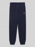 CHAMPION Sweatpants mit Logo und elastischem Bund in Marine, Größe 152
