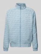 PUMA PERFORMANCE Regular Fit Trainingsjacke mit Allover-Print in Hellb...