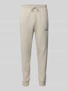 adidas Sportswear Sweatpants mit elastischem Bund in Sand, Größe L