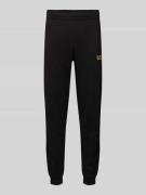 EA7 Emporio Armani Sweatpants mit Logo und elastischem Bund in Black, ...