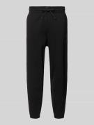 Tommy Jeans Regular Fit Sweatpants aus Baumwoll-Mix in Black, Größe L