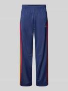 adidas Originals Regular Fit Trackpants aus recyceltem Material in Dun...
