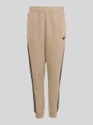 adidas Originals Regular Fit Sweatpants mit Trefoil in Beige, Größe 14...