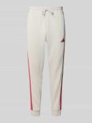 adidas Sportswear Regular Fit Sweathose mit Logo-Stitching in Beige, G...