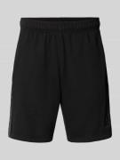 CHAMPION Shorts mit Logo und elastischem Bund in Black, Größe L