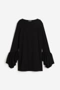 H&M Kleid mit Volant Schwarz, Alltagskleider in Größe XS. Farbe: Black