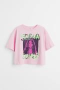 H&M Cropped Jerseyshirt mit Print Hellrosa/Selena Gomez, T-Shirts & To...