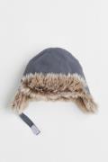 H&M Wasserabweisende Mütze Graublau, Hut in Größe 62/68. Farbe: Grey-b...