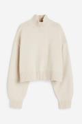 H&M Oversized Pullover mit Turtleneck Hellbeige in Größe M. Farbe: Lig...