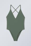 Weekday Badeanzug mit tiefem V-Ausschnitt Dusty Green, Jumpsuits in Gr...