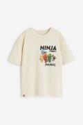 H&M T-Shirt mit Print Hellbeige/LEGO Ninjago, T-Shirts & Tops in Größe...