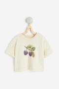 H&M T-Shirt mit Print Hellbeige/Beeren, T-Shirts & Tops in Größe 50. F...